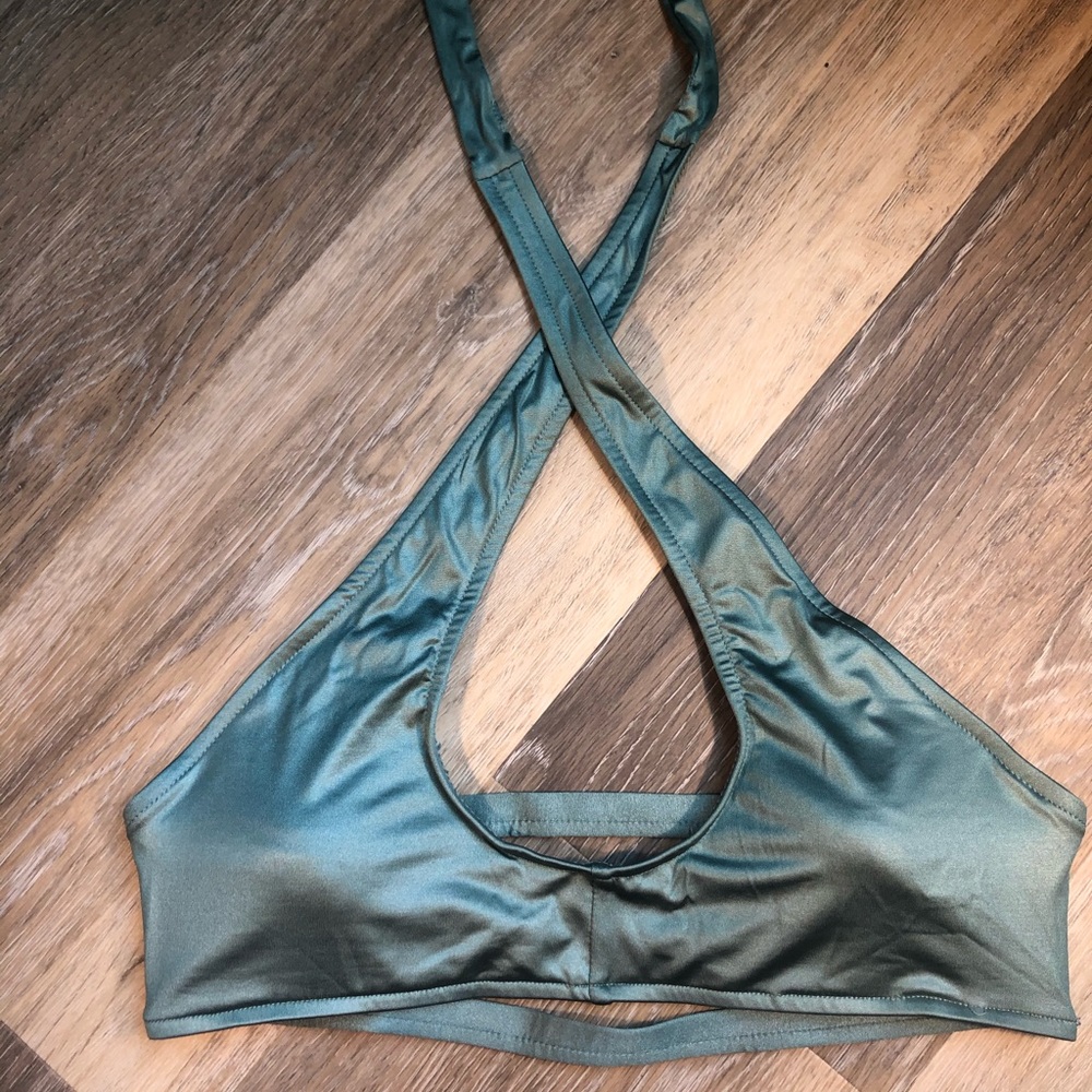 Top shop green swim top. Could fit both a Sm/M.